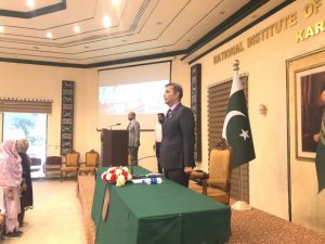 Director General NIPA Karachi Dr. Syed Saif ur Rehman, PAS, TI rise up in the respect of National Anthem of Pakistan. 